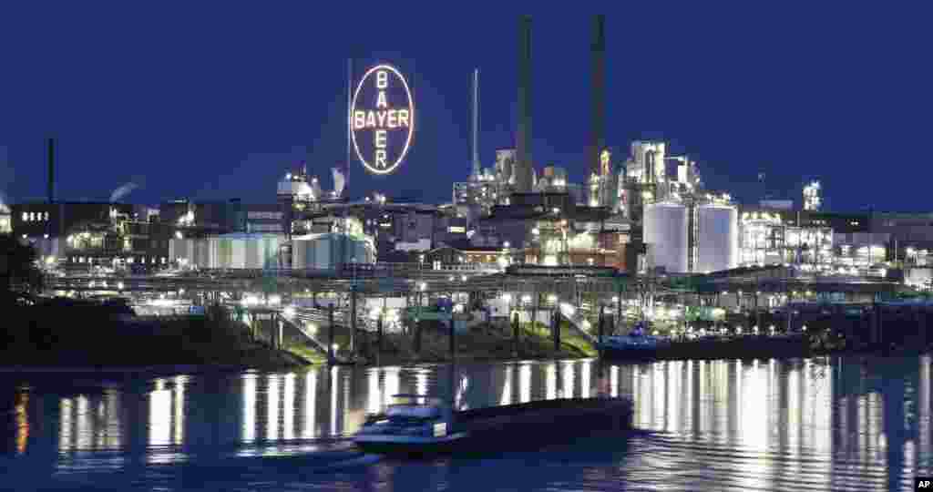 A ship passes the main chemical plant of German Bayer AG in Leverkusen, Germany. The company faces about 18,400 lawsuits against subsidiary Monsanto for the use of its glyphosate-based weedkiller Roundup in the United States.