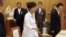South Korean President Park Geun-hye, center, arrives to preside over a security meeting to discuss the upcoming South and North Korea talks at the presidential house in Seoul, South Korea, June 10, 2013.