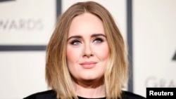 FILE - Singer Adele arrives at the 58th Grammy Awards in Los Angeles, California, Feb. 15, 2016. 