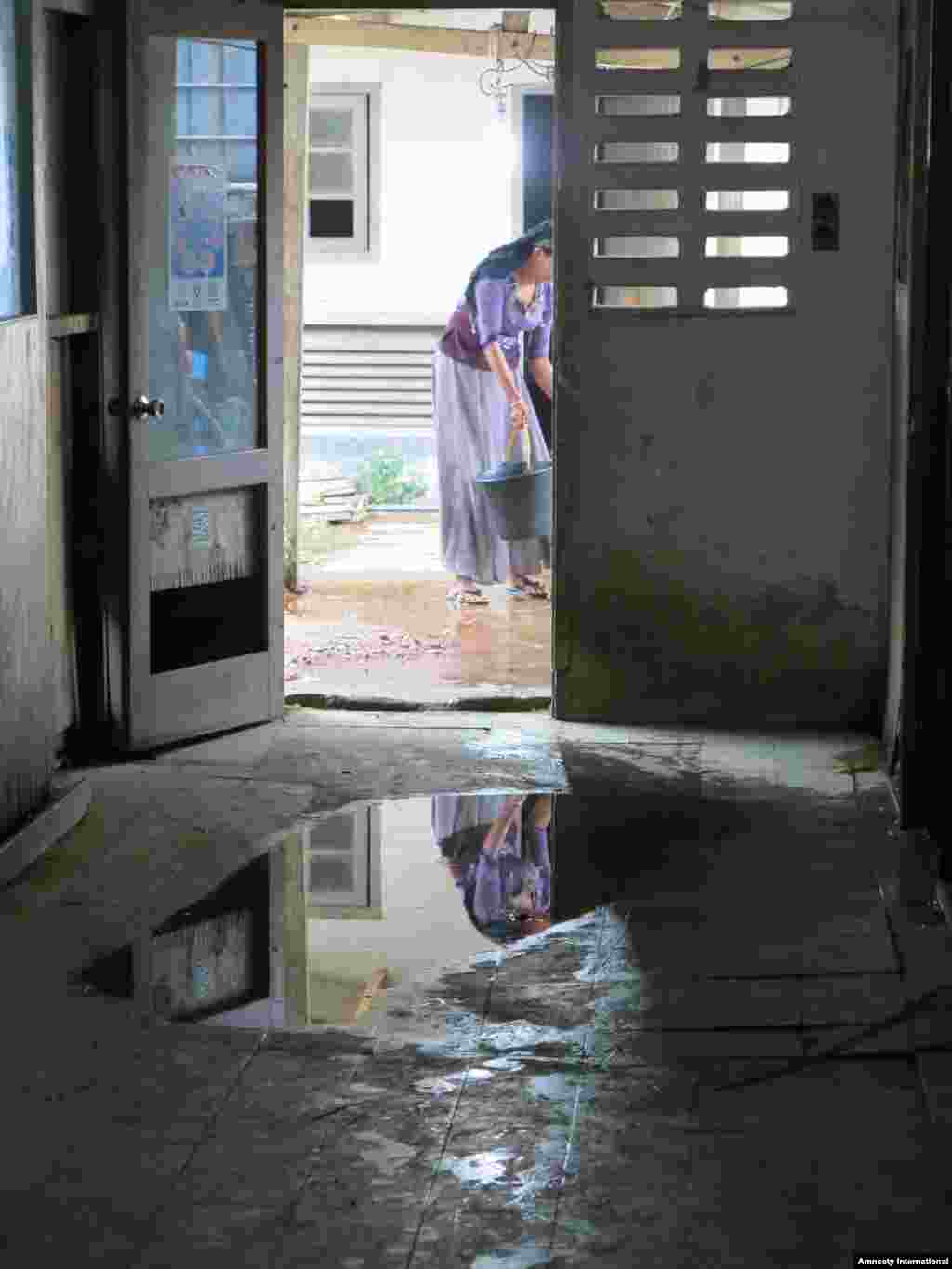 Hallway of Rohingya women's quarters at shelter in Indonesia.