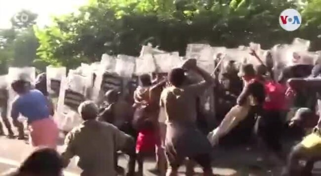 Enfrentamiento de Guardia Nacional con caravana de migrantes