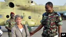 FILE- Released Swiss hostage Beatrice Stockly arrives by helicopter from Timbuktu, April 24, 2012.