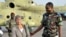 FILE- Released Swiss hostage Beatrice Stockly arrives by helicopter from Timbuktu, April 24, 2012.