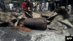 지난 12일 나이지리아 북동부 콘두가에서 발생한 방화 사건 현장.