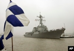 FILE - Guided missile destroyer USS Lassen arrives in Shanghai, China.