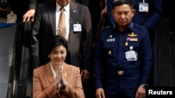 Thủ tướng Thái Lan Yingluck Shinawatra sau khi một cuộc họp quốc phòng tại Bangkok, ngày 4/3/2014.