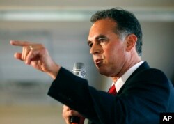 FILE - In this April 26, 2016, photo, Danny Tarkanian participates in a Republican debate in Nevada's 3rd Congressional District in Henderson.