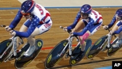 Team USA with Jennie Reed, Dotsie Bausch, and Sarah Hammer (L-R), competes to take a silver medal in the women's team pursuit final during the Track Cycling World Championships in Apeldoorn, Netherlands, March 24, 2011.