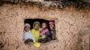 Une famille nigérienne dans le village de Dargué, dans la région de Maradi, au Niger, le 16 août 2018.