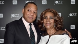 Trumpeter Wynton Marsalis (L) and singer Aretha Franklin attend the opening of the Mica and Ahmet Ertegun Atrium at Jazz at Lincoln Center on Dec. 17, 2015 in New York City. 