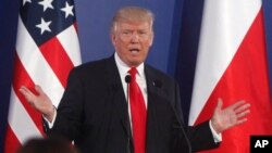 U.S. President Donald Trump gestures while answering a question during a joint press conference with Poland's President Andrzej Duda, in Warsaw, Poland, July 6, 2017. 