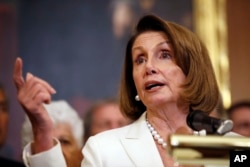 FILE - House Minority Leader Nancy Pelosi of California speaks during a news conference on Capitol Hill, Sept. 26, 2018, in Washington.