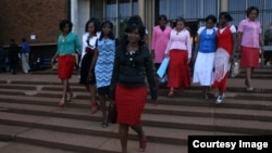 Some of Gumbura's wife outside the magistrates courts in Harare.