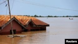A house partially submerged in flood waters is pictured in Lokoja city, Kogi State, Nigeria, Sept. 17, 2018. 