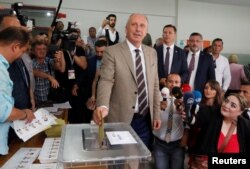 Muharrem Ince, presidential candidate of main opposition Republican People's Party (CHP), casts his ballot at a polling station in Yalova, Turkey, June 24, 2018.