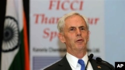 US Commerce Secretary John Bryson speaks at a function organized by the Federation of Indian Chambers of Commerce and Industry (FICCI) in New Delhi, India, Monday, March 26, 2012. Bryson is on an official visit to India. (AP Photo/Mustafa Quraishi)