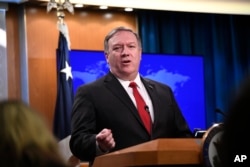 Secretary of State Mike Pompeo answers a question during a news conference, March 26, 2019, at the Department of State in Washington.