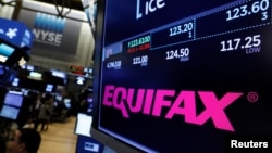The Equifax logo and trading information are displayed on the floor of the New York Stock Exchange in New York, Sept. 8, 2017. 