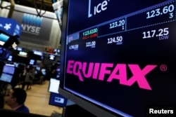 The Equifax logo and trading information are displayed on the floor of the New York Stock Exchange in New York, Sept. 8, 2017.