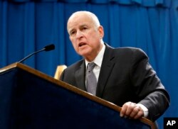 FILE - California Gov. Jerry Brown responds to a question at a news conference in Sacramento, Jan. 10, 2018.