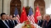 FILE - U.S. President Donald Trump, U.S. Secretary of State Mike Pompeo, U.S. President Donald Trump's national security adviser John Bolton and Chinese President Xi Jinping attend a working dinner after the G-20 leaders' summit in Buenos Aires, Argentina, Dec. 1, 2018. 