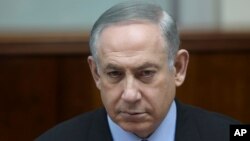 Israeli Prime Minister Benjamin Netanyahu chairs the weekly cabinet meeting, in Jerusalem, Feb. 19, 2017. 
