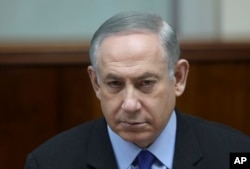 Israeli Prime Minister Benjamin Netanyahu chairs the weekly cabinet meeting, in Jerusalem, Feb. 19, 2017.
