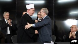 FILE - The President of the World Federation of Bergen-Belsen Associations, Menachem Rosensaft (R) and the religious leader of Bosnian Muslims, Husein Kavazovic (L) embrace after signing a "Jewish-Muslim Initiative for Peace" in Srebrenica on January 27, 2024