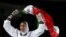 Kimia Alizadeh Zenoorin of Iran celebrates after winning the bronze medal in a women's Taekwondo 57-kgcompetition at the 2016 Summer Olympics in Rio de Janeiro, Brazil, Aug. 18, 2016.