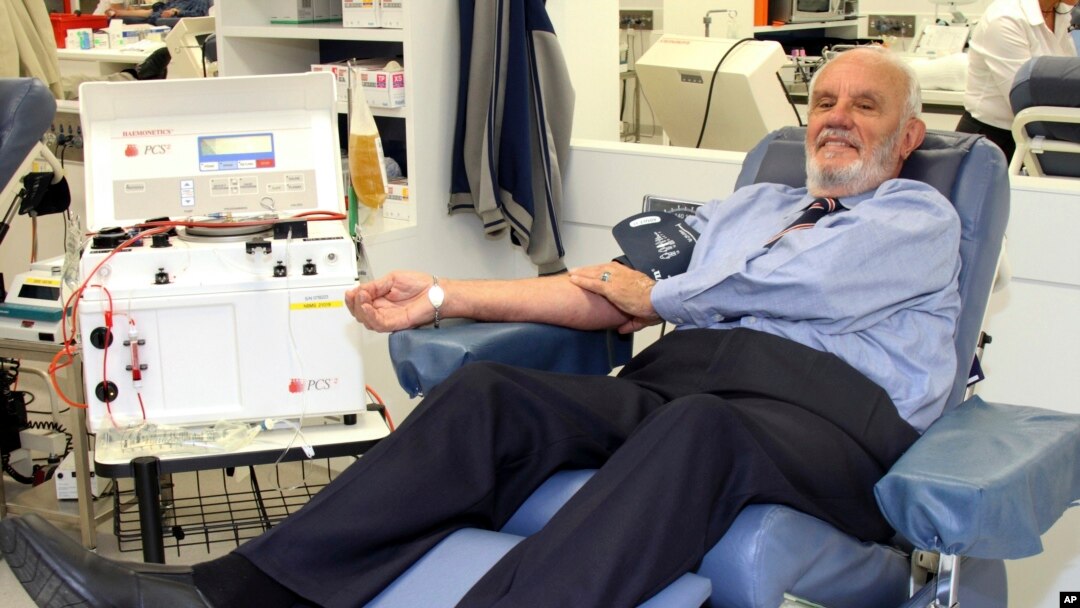 FILE - In this May, 2011 photo, donor James Harrison, credited with saving 2.4 million babies through his record-breaking blood plasma donations over decades, is giving blood at donation center in Sydney. (Australian Red Cross Lifeblood via AP)