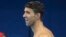 United States' Michael Phelps smiles as he arrives for a swimming training session at the 2016 Summer Olympics in Rio de Janeiro, Brazil, Aug. 2, 2016.