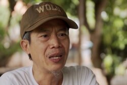 This screen grab from video footage taken July 9, 2019 shows Faiyen band member Trairong "Khunthong" Sinseubpol speaking during an interview at an undisclosed location in Laos.