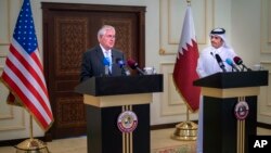 U.S. Secretary of State Rex Tillerson, left, and the Qatari Minister of Foreign Affairs Sheikh Mohammed bin Abdulrahman Al Thani take part in a press conference in Doha, Qatar, July 11, 2017.