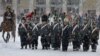 Historical re-enactors dressed as 1812-era French soldiers march during a re-enactment of the French Invasion of Russia during celebrations to mark the Russian Orthodox Christmas in St. Petersburg, Russia, January 7, 2013. 