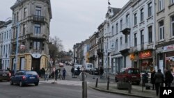 Belgian police officers guard a street in Verviers, Jan. 16, 2015. 