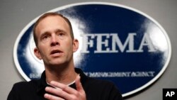 FILE - Federal Emergency Management Agency Administrator Brock Long speaks during a news conference in Washington, Aug. 31, 2017. 