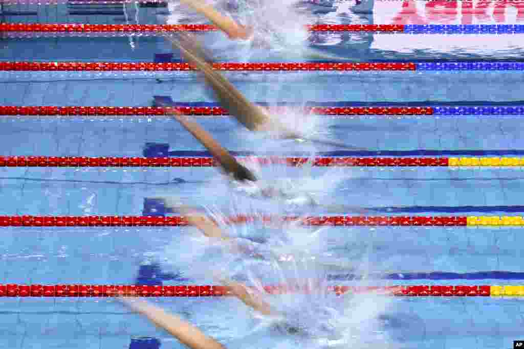 Athletes compete in the Men&#39;s 200m Butterfly Heats on day three of the World Short Course Swimming Championships in Budapest, Hungary.