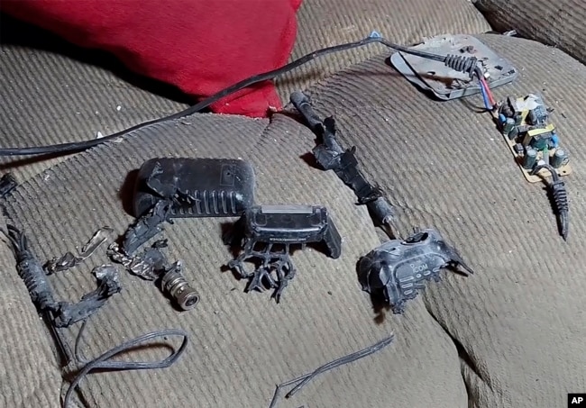 This photo from video shows a walkie-talkie that exploded inside a house in Baalbek, east Lebanon, on Sept. 18, 2024.