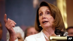 FILE - House Minority Leader Nancy Pelosi of California speaks during a news conference on Capitol Hill, Sept. 26, 2018, in Washington. 