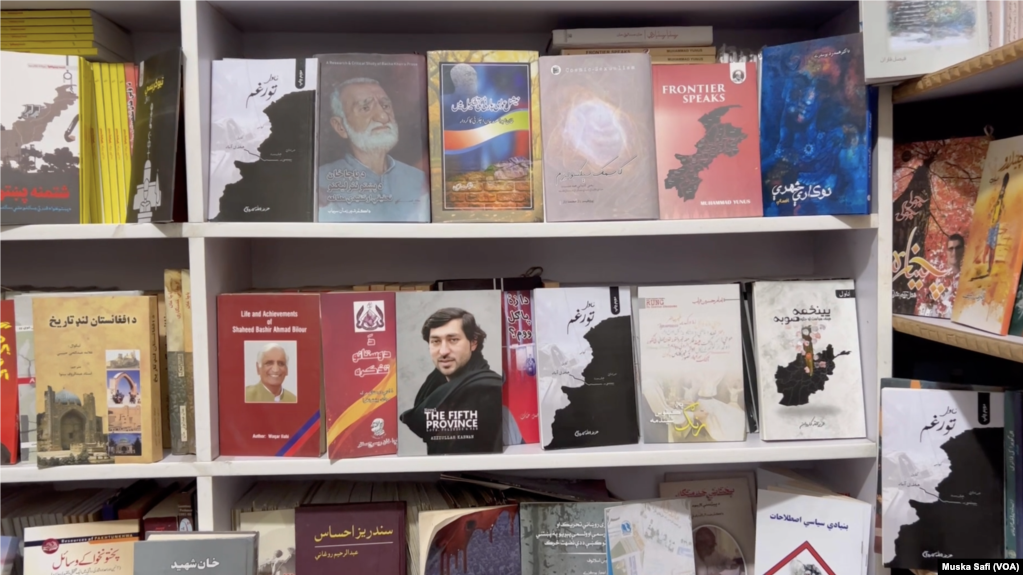 Books by Afghan and Pakistani authors are displayed in a store in Peshawar, Pakistan, March 14, 2025. The Taliban have banned 400 titles in Afghanistan.