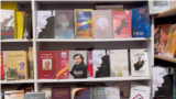 Books by Afghan and Pakistani authors are displayed in a store in Peshawar, Pakistan, March 14, 2025. The Taliban have banned 400 titles in Afghanistan.
