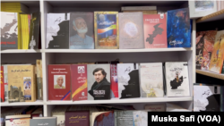 Books by Afghan and Pakistani authors are displayed in a store in Peshawar, Pakistan, March 14, 2025. The Taliban have banned 400 titles in Afghanistan.