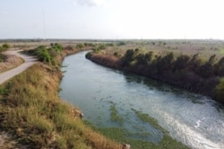The Rio Grande divides the cities of Brownsville, Texas, right, and Matamoros, Tamaulipas, Mexico, on March 16, 2021.