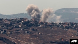 Asap mengepul selama pengeboman Israel di Lebanon selatan pada 25 Juni 2024, di tengah bentrokan lintas batas yang sedang berlangsung antara pasukan Israel dan pejuang Hizbullah. (Foto: AFP)