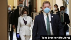 U.S. Speaker of the House Nancy Pelosi wears a face mask in Congress