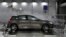 FILE - A Ford Focus is tested in heavy rain and wind in a testing room at the brand new Ford Environmental Test Center in Cologne, May 17, 2018. 