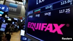 The Equifax logo and trading information are displayed on the floor of the New York Stock Exchange in New York, Sept. 8, 2017. 