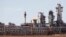 FILE - A view of Krechba gas treatment plant, about 1200 km (746 miles) south Algiers, Dec. 14, 2008. 