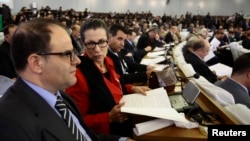 Louisa Hanoune, second left, Leader of Algeria's Workers' Party attends the constitutional reforms vote session in Algiers, Algeria, Feb. 7, 2016. 