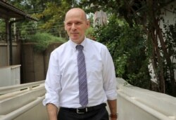 FILE - The U.S. Ambassador to South Sudan Thomas Hushek speaks to The Associated Press at the embassy in Juba, South Sudan, June 25, 2018.